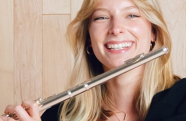 This featured image is of Dana Sparling holding her flute.