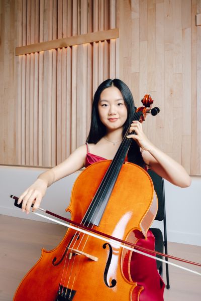 Photo of Kristen Kim playing the cello
